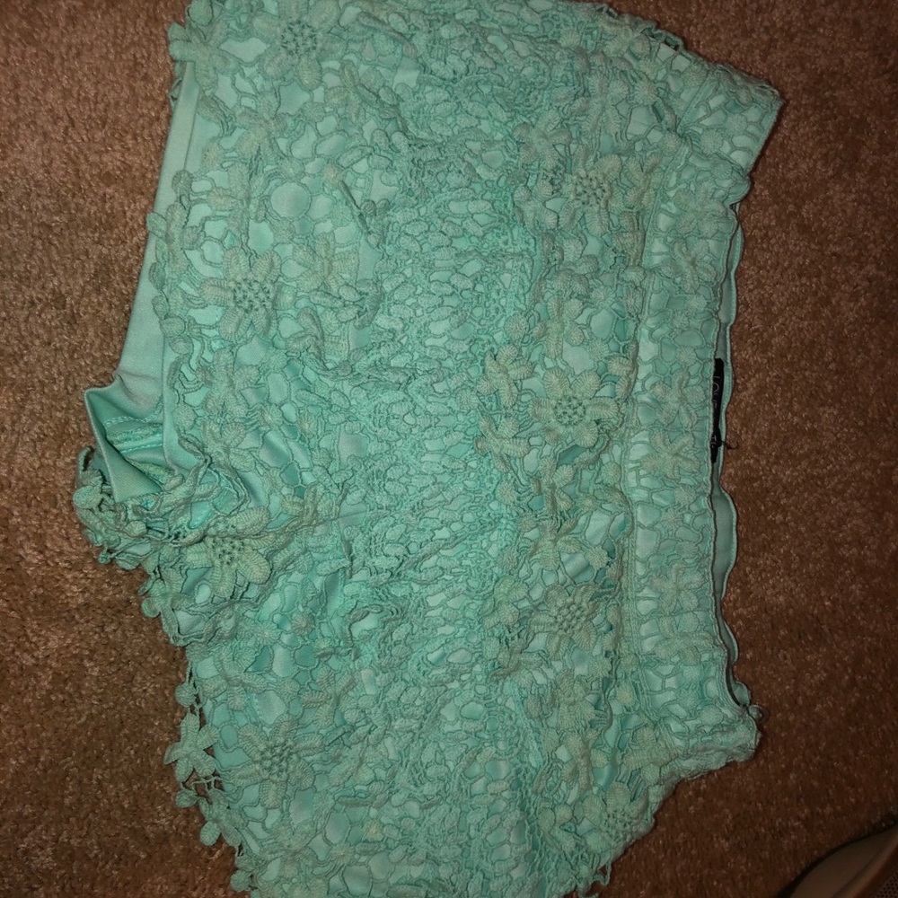 Mint green ruffled shorts